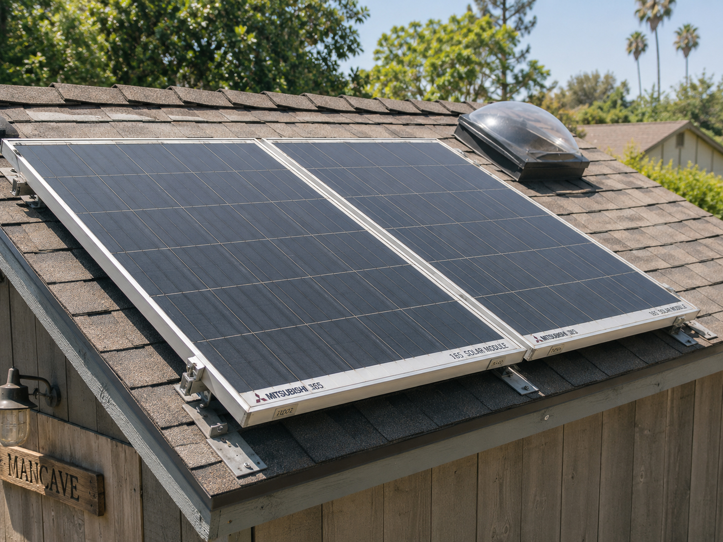 Legacy 2002 Mitsubishi solar panels on the Solar Man Cave roof